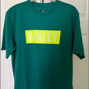 Men’s Oakley t-shirt, size Medium, green with yellow lettering.